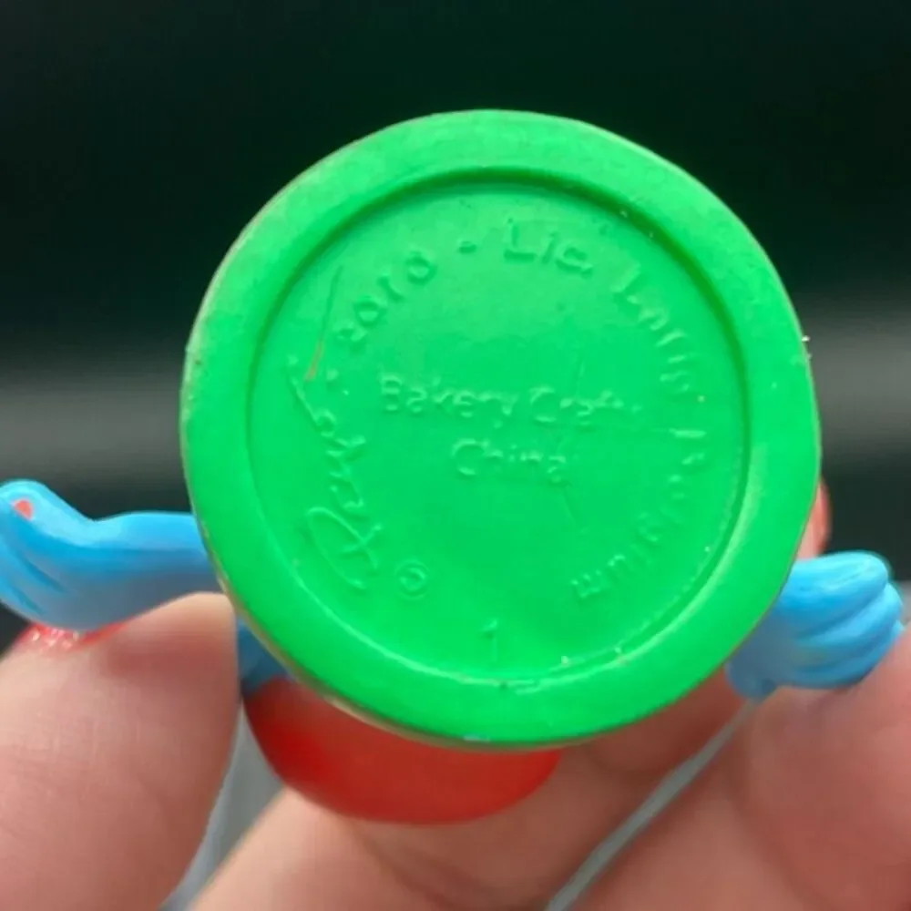 Vintage 2010 Peyo Smurf Figurine on Green Base PVC Toy Collectible